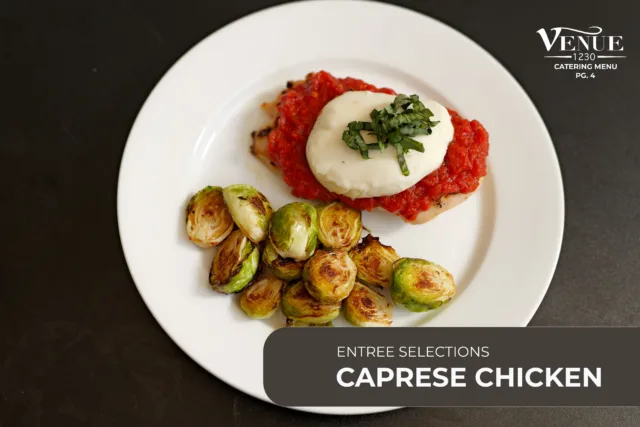 Plate with caprese chicken (mozzarella and basil) atop red tomato sauce, served with roasted Brussels sprouts on a white plate as a catering dish image.